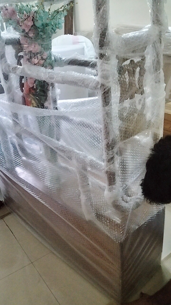 Fragile decor items wrapped in multi layer bubble wrap